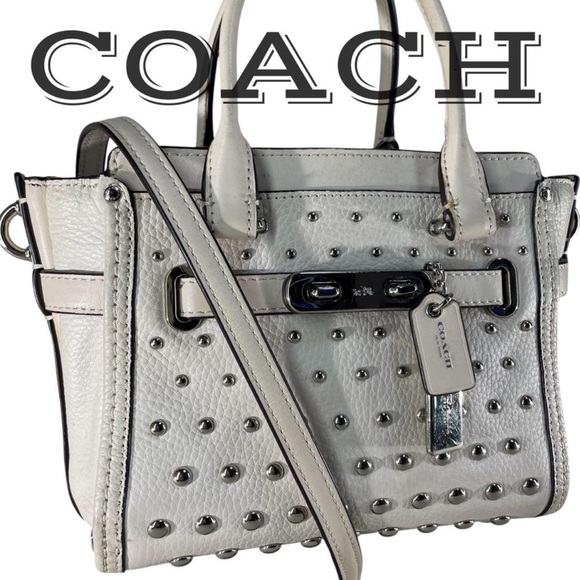 Coach Handbags - Coach Swagger 21 w/Studs EUC